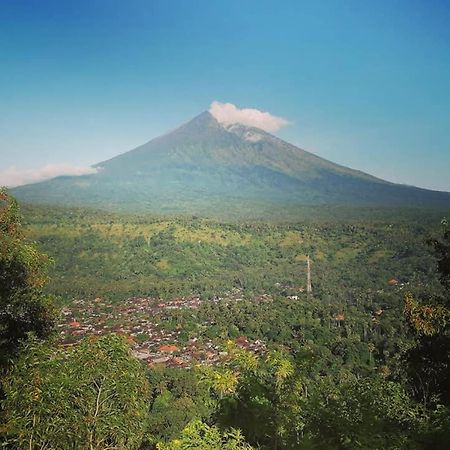 Amed Stop Inn Homestay, Rooftop Restaurant And Bar エクステリア 写真