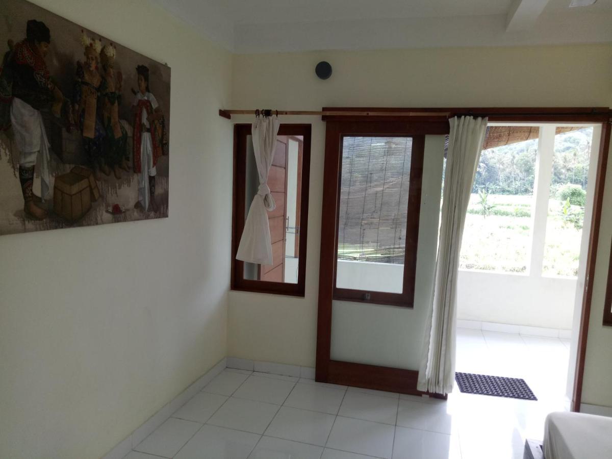 Amed Stop Inn Homestay, Rooftop Restaurant And Bar エクステリア 写真