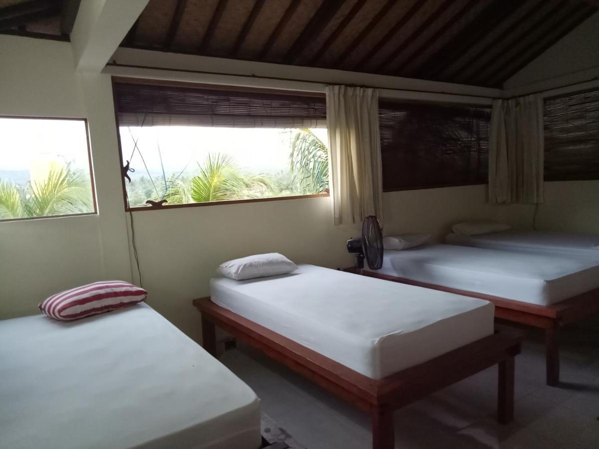 Amed Stop Inn Homestay, Rooftop Restaurant And Bar エクステリア 写真