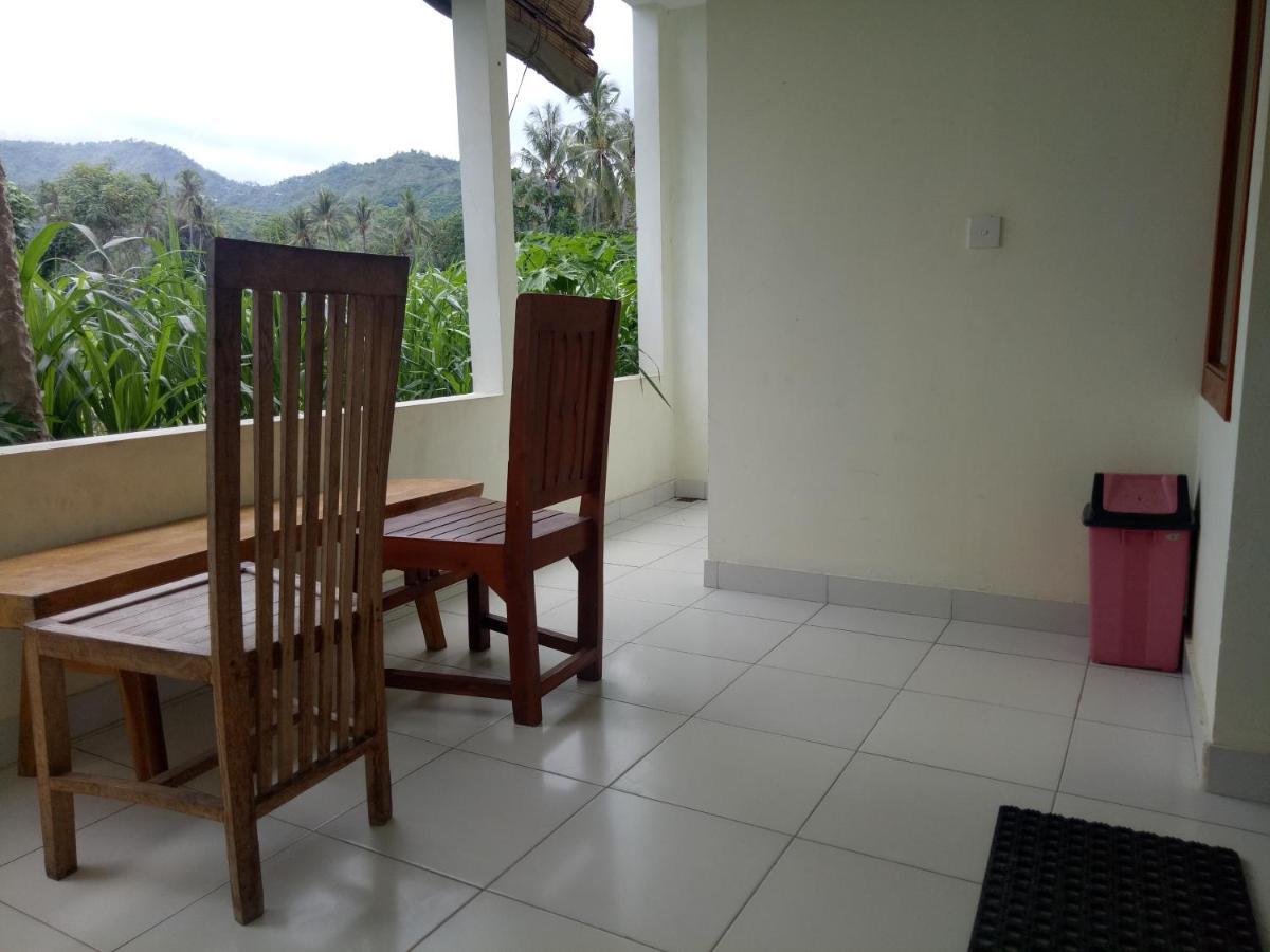 Amed Stop Inn Homestay, Rooftop Restaurant And Bar エクステリア 写真