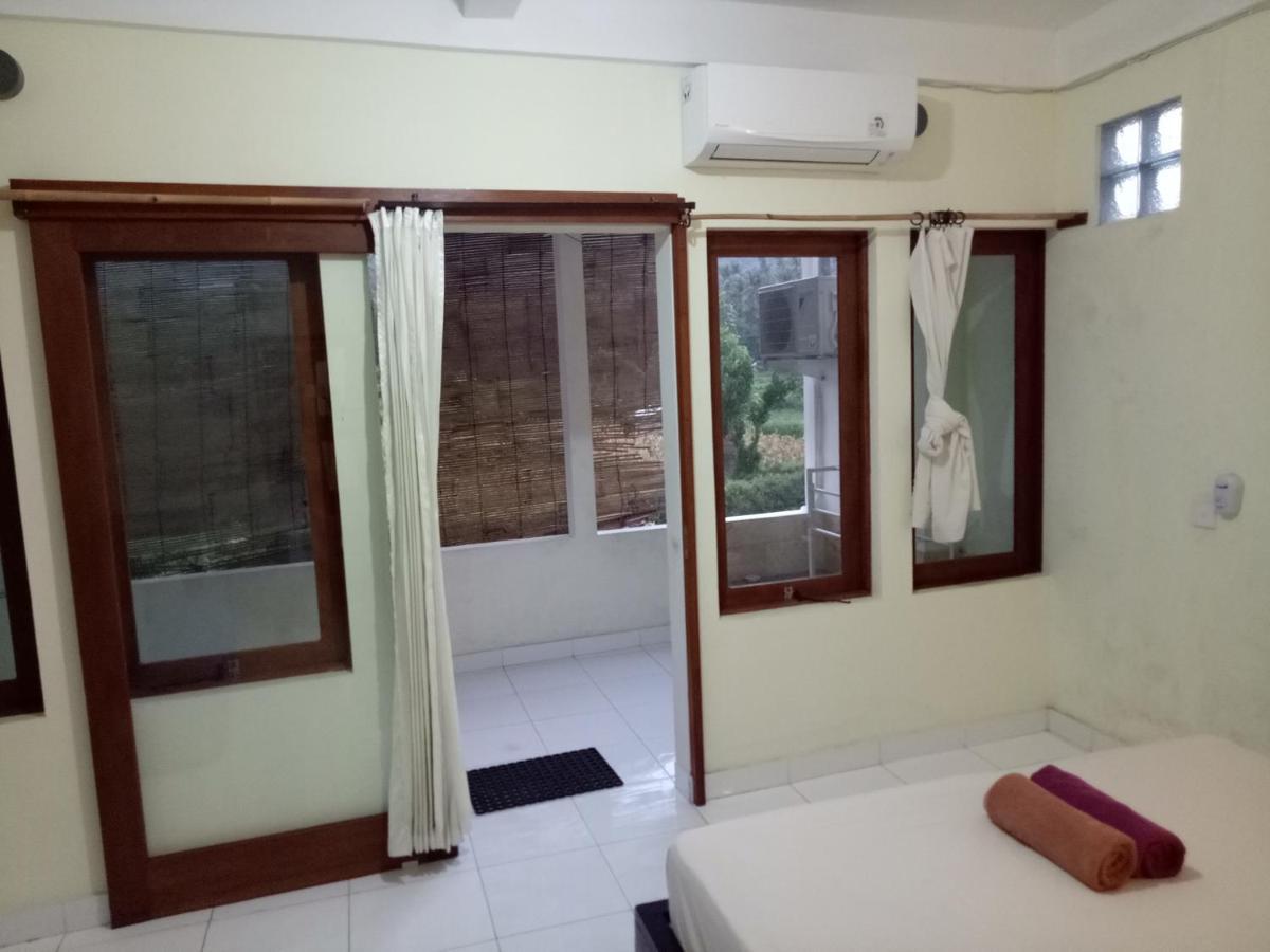 Amed Stop Inn Homestay, Rooftop Restaurant And Bar エクステリア 写真